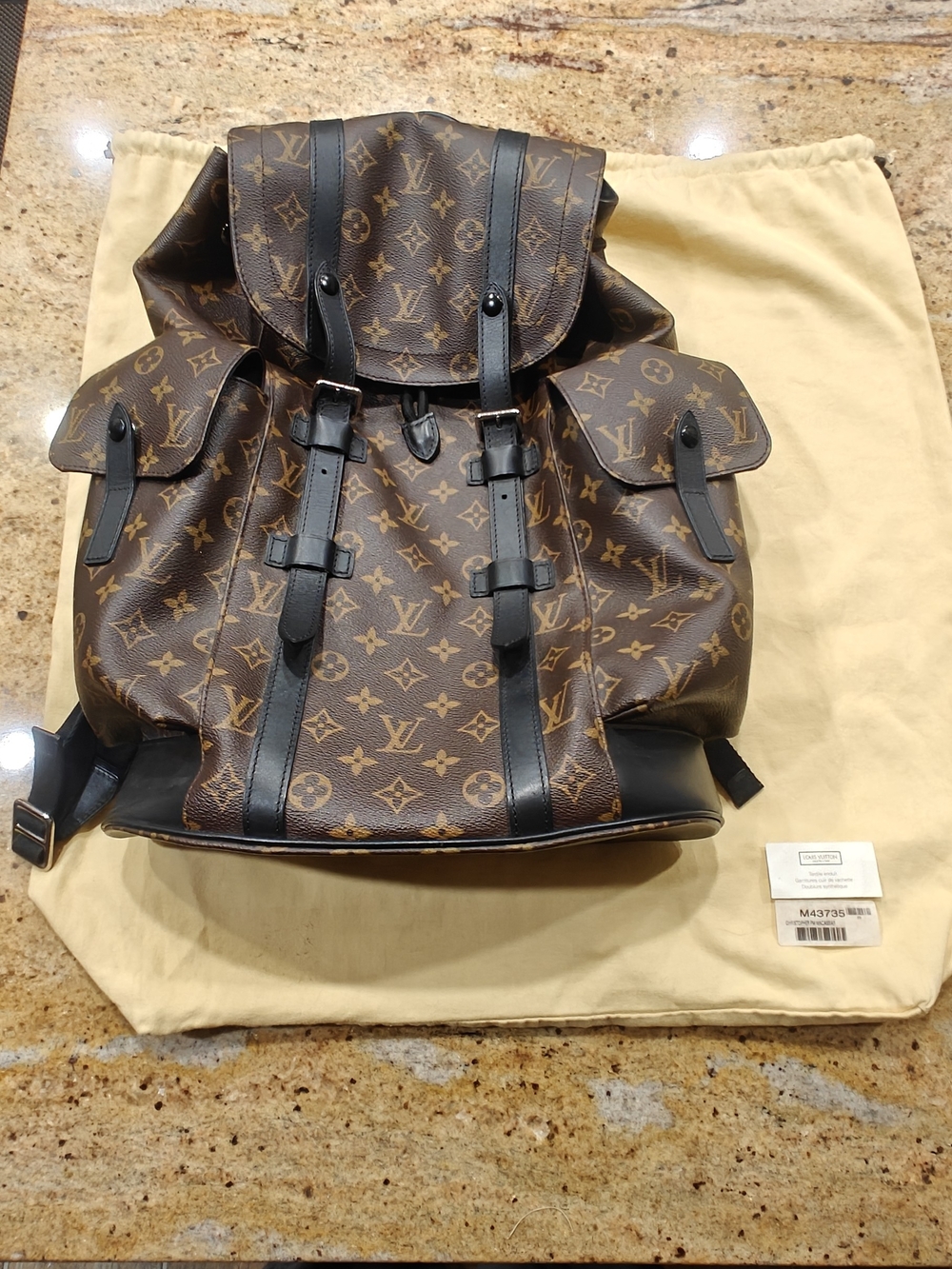 Louis Vuitton Monogram Canvas Backpack with Black Leather Trim